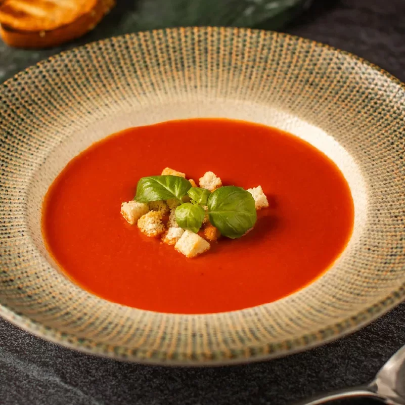 Creamy tomato soup with croutons